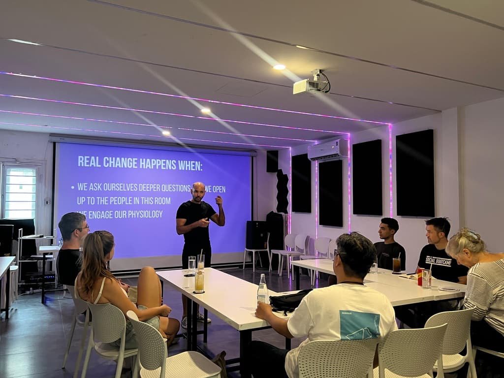 Gilad speaking to participants during a workshop